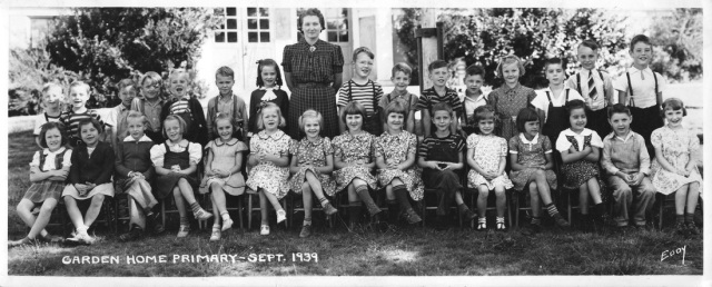 1939 Garden Home School, primary grades. Leo Feldman in top row next to teacher, Zora & Sharka Becvar, center front row.