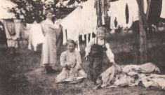 Wash day, Elsie, Ida and Frieda Von Bergen hanging out the wash (vintage photo)