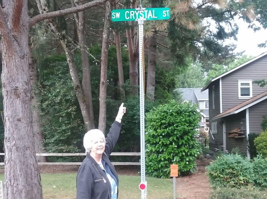 Crystal Steele and street sign